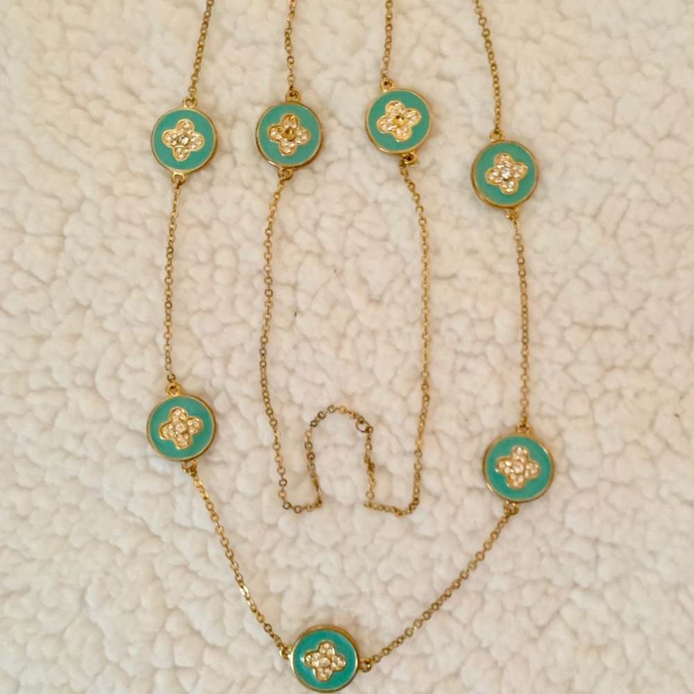 Necklace . Gold color chain 36” is entire length .